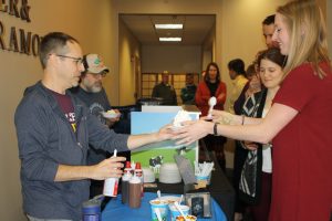 TBC employees being served Ben & Jerry's ice cream